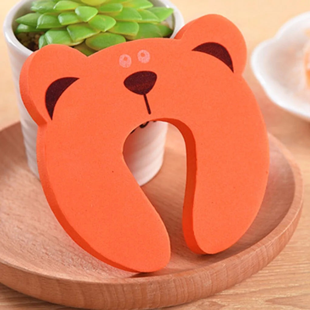 Topes de puerta para bebés